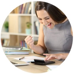 a woman excited using a calculator